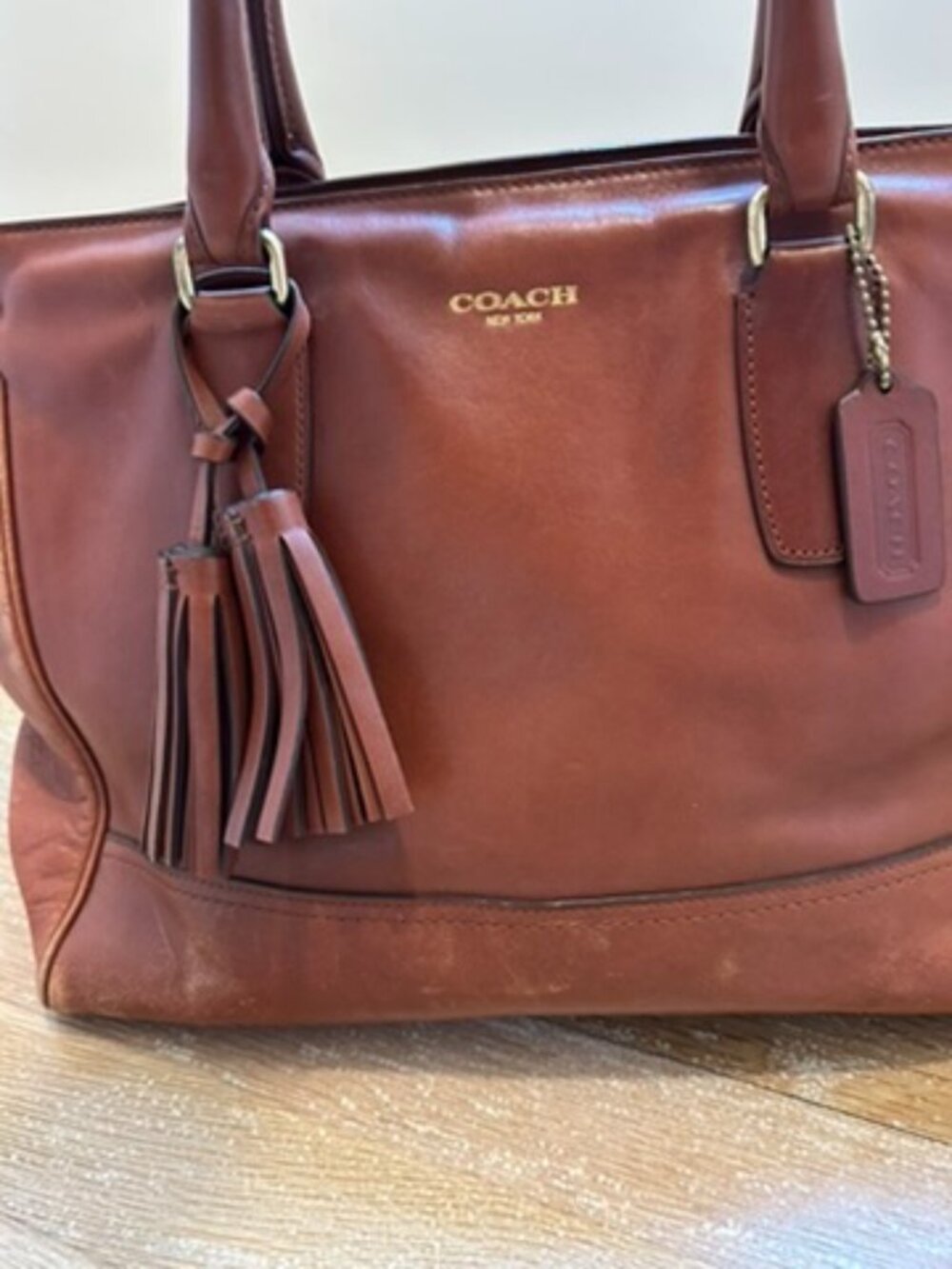 Coach bucket tote w/ tassle in camel leather